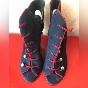 Navy blue with red trim sandals.